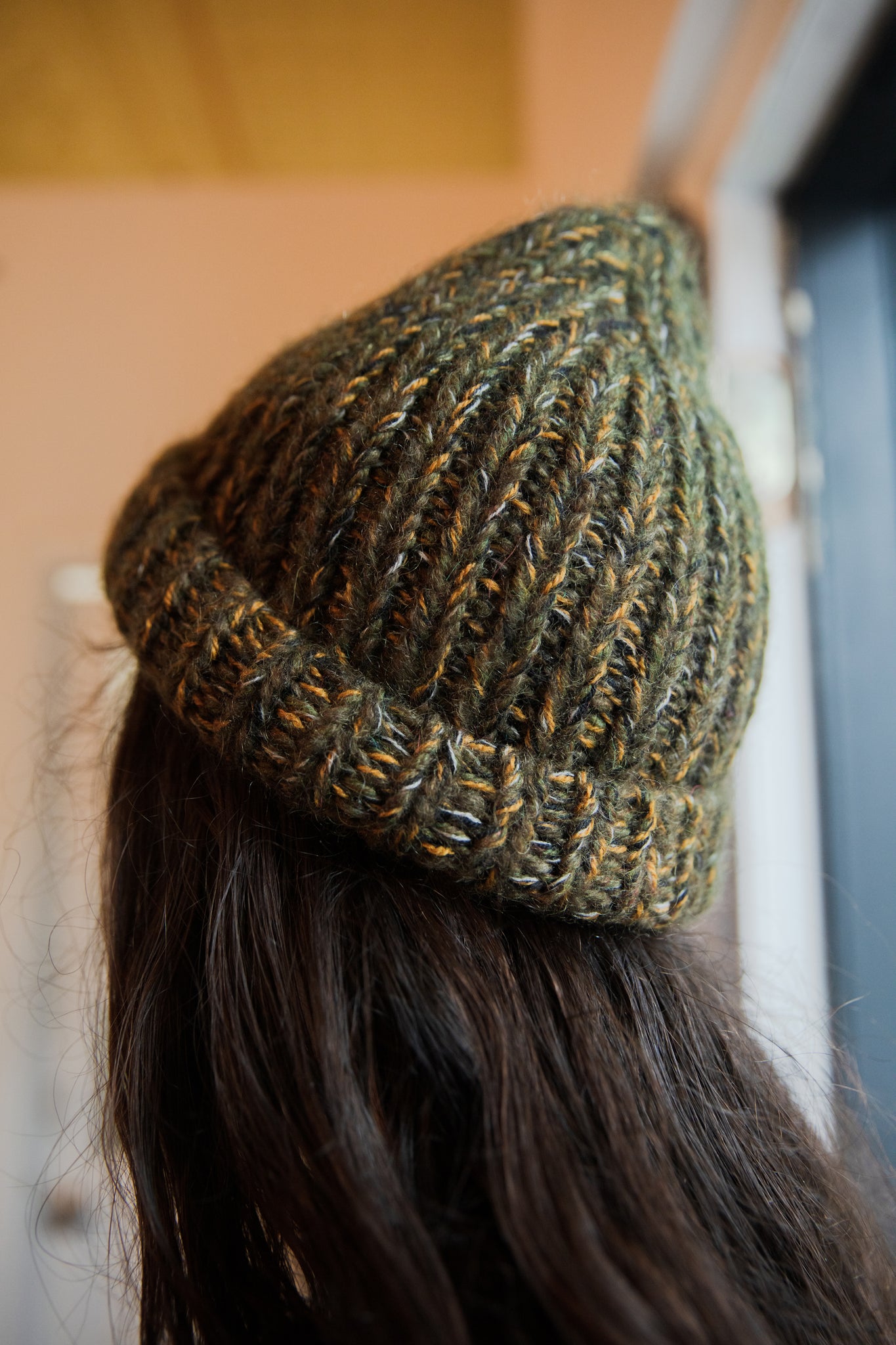 dark green and gold marle hand knit cap