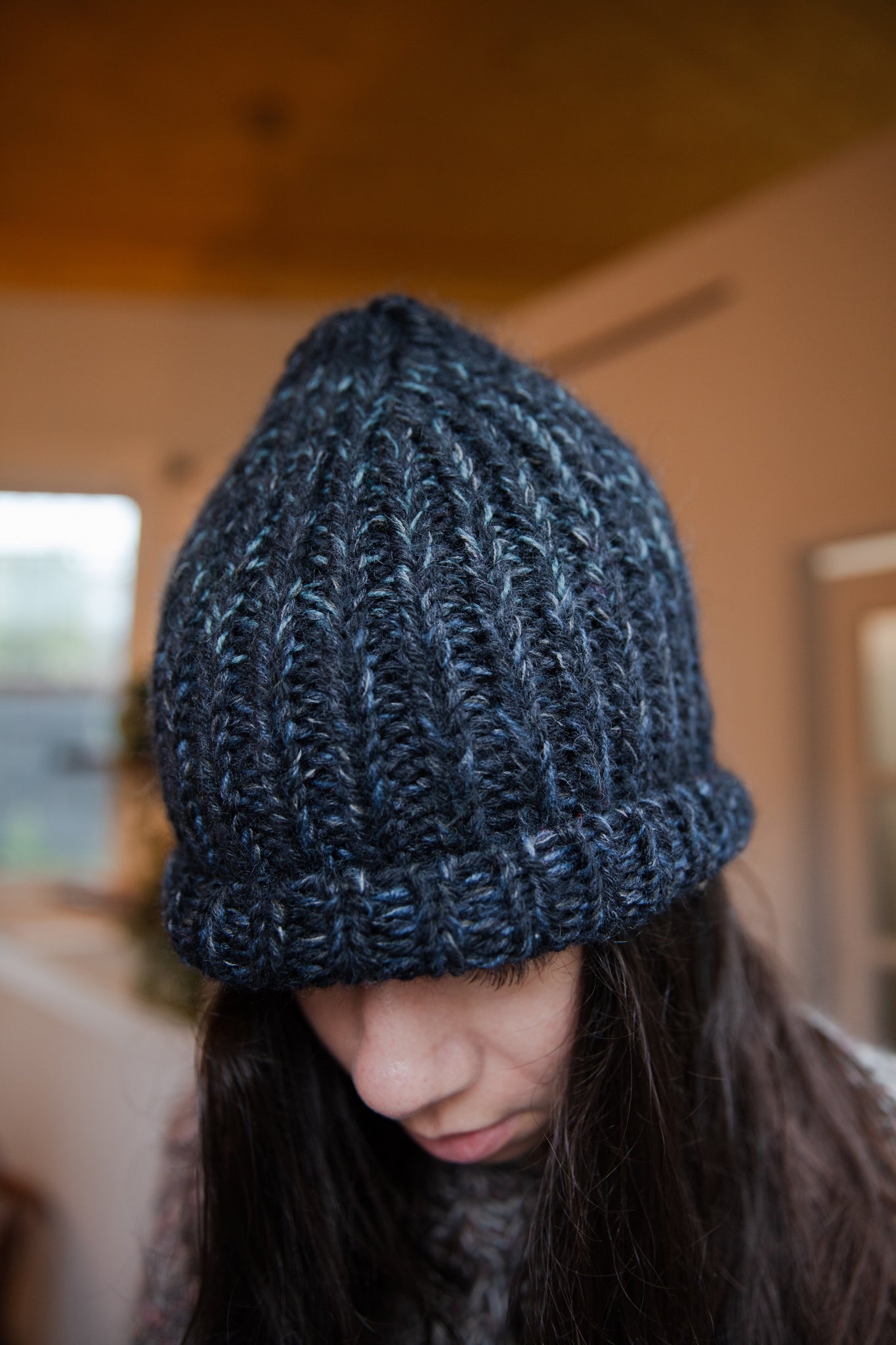 tonal black and light blue marle hand knit cap