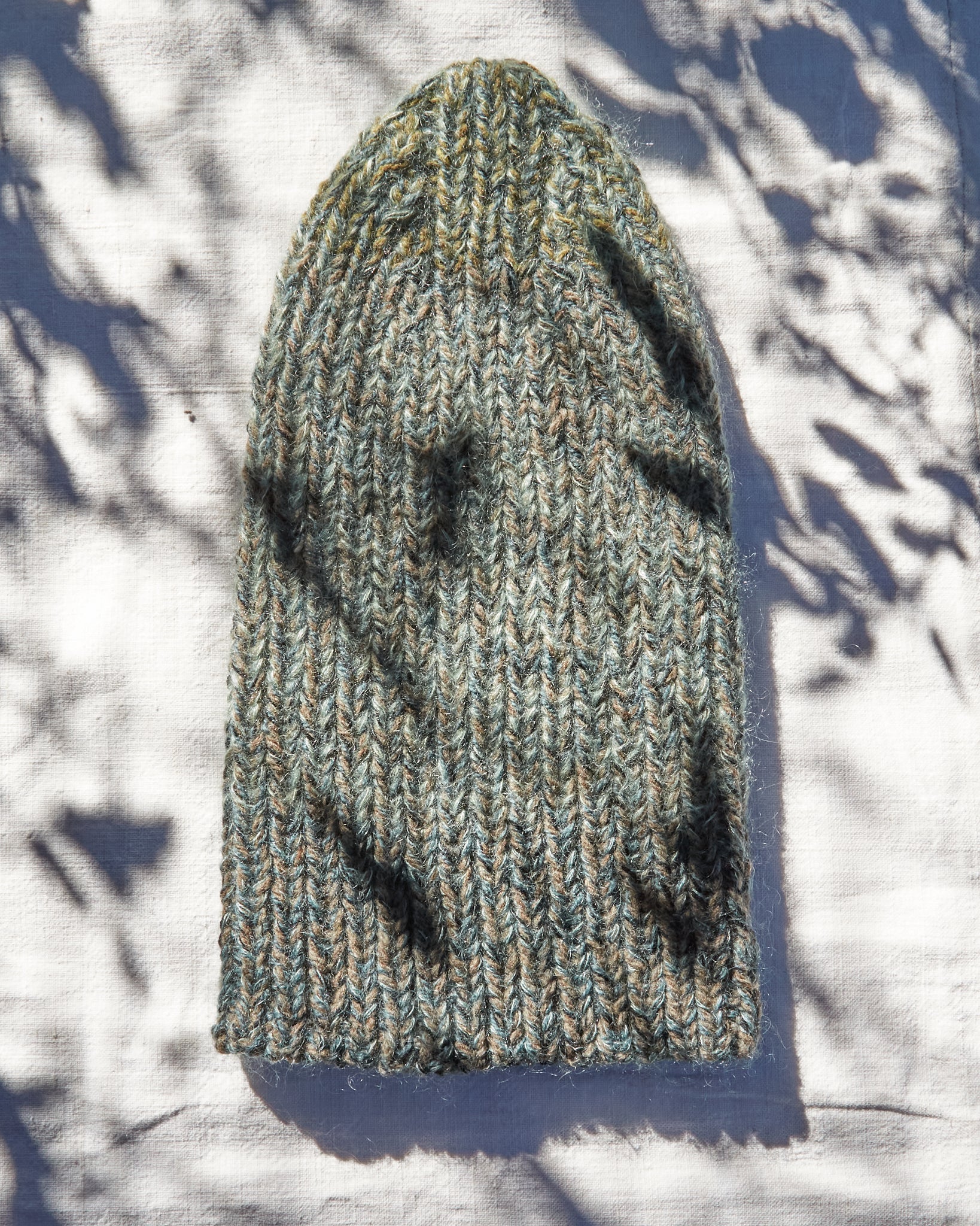 blue and brown marle hand knit cap